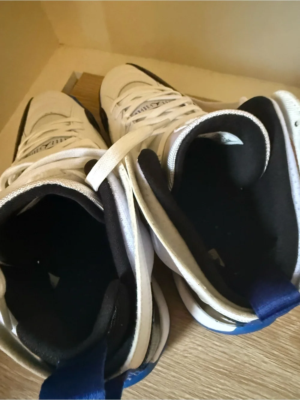 Jordan Retro High-Top Sneakers in White, Black & Blue
